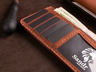 Шкіряне портмоне дві секції на кнопці та зовнішнім відділом на замочку