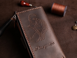 Шкіряне портмоне дві секції на кнопці та зовнішнім відділом на замочку