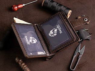 Шкіряний гаманець 6 відділів для карток, 2 прозорих, 2 таємних та зовнішня кишеня для монет на замочку