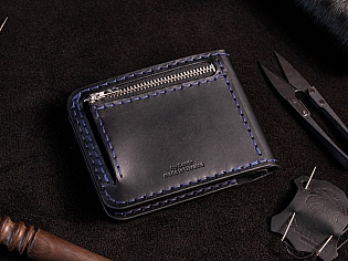 Шкіряний чоловічий гаманець з чотирма відділами для карт та зовнішній відділ для монет на замочку