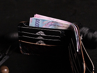 Шкіряний гаманець з унікальним малюнком та монетницею