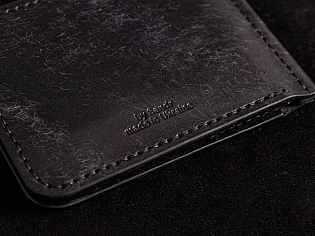 Шкіряний гаманець-затиск чорного кольору максимально тонкий із відділами для карток