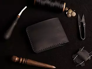 Шкіряний чоловічий гаманець 4 відділи для карток