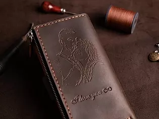 Шкіряне портмоне дві секції на кнопці та зовнішнім відділом на замочку