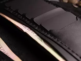 Гаманець шкіряний на рівну купюру дванадцять карток та зовнішній відділ на замочку