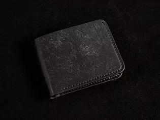 Шкіряний чоловічий гаманець 4 відділи для карток та зовнішня кишенька для монет