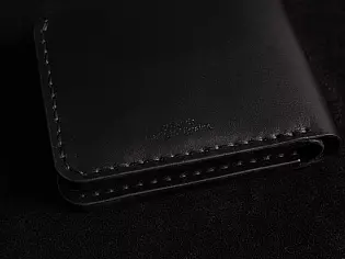 Чоловічий шкірняий гаманець пошитий вручну поміщає 6 відділів для карток та 2 таємних 