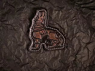 Патч із тисненим зображенням міфічного лева-охоронця