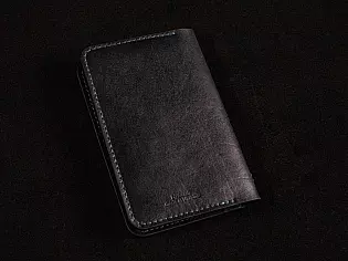 Шкіряна обкладинка для паспорта книжечки з тисненням та малюнком голови лева