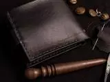 Шкіряний крафтовий гаманець на кнопці з прозорими відділами для документів, карток та монет