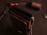 Шкіряне портмоне дві секції на кнопці та зовнішнім відділом на замочку