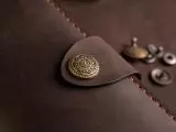 Шкіряне портмоне дві секції на кнопці та зовнішнім відділом на замочку
