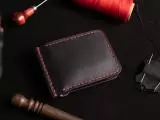 Шкіряний затиск для купюр пошитий з натуральної шкіри вміщає 7 відділів для карток та 2 таємних