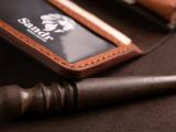 Шкіряне портмоне дві секції на кнопці та зовнішнім відділом на замочку